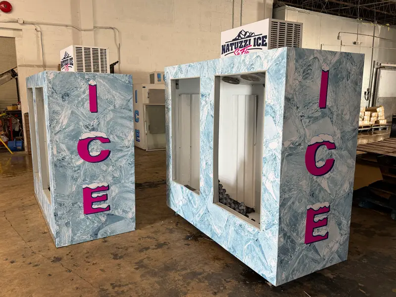 Two wrapped Natuzzi Ice SoFlo merchandisers in the Fort Lauderdale warehouse